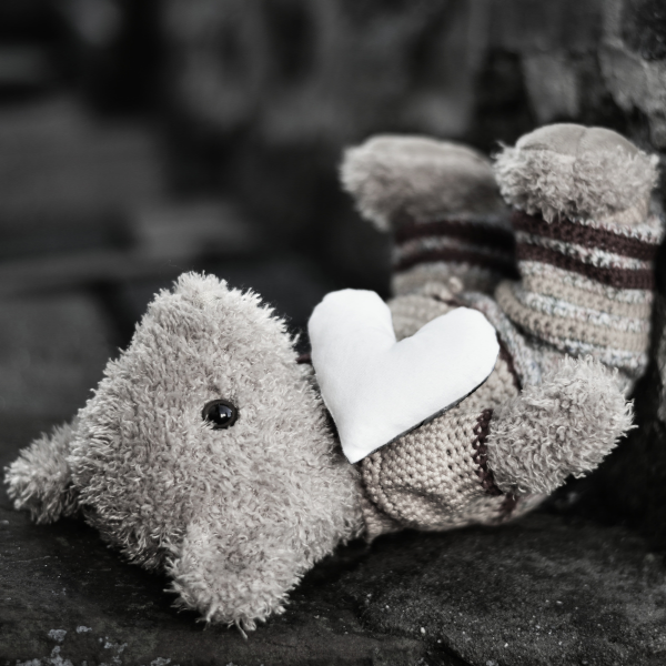 Teddy bear with sad heart